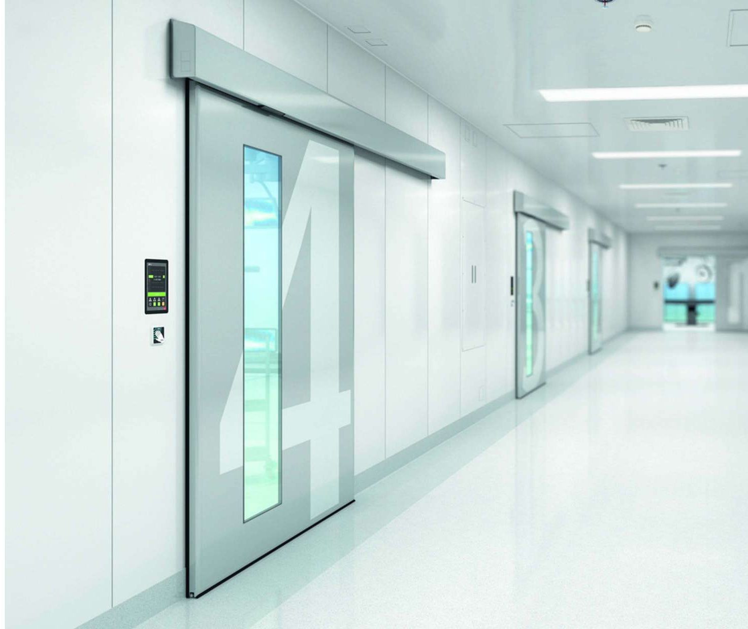 A hospital corridor with sliding doors